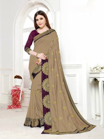 Simple And Elegant Looking Designer Saree Is Here In Beige Color Paired With Lovely Wine Colored Blouse. This Saree And Blouse Are Silk Based Beautified With Heavy Embroidery And Stone Work. 