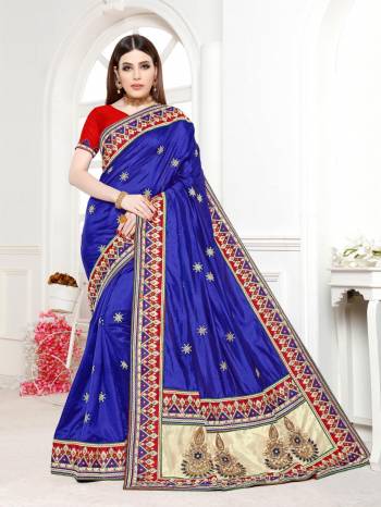 Bright And Visually Appealing Color Is Here With This Designer Saree In Royal Blue Color Paired With Contrasting Red Colored Blouse. Its Bright Color Pallete And Embroidery Will Give An Attractive Look To The Saree.