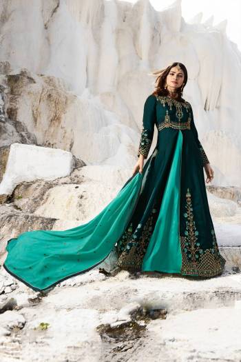 Go With The Shades Of Blue With This Heavy Designer Indo-Western Suit In Teal Blue Colored Top Paired With Turquoise Blue Colored Bottom And Dupatta. Its Top Is Fabricated On Art Silk Paired With Santoon Bottom And Georgette Dupatta. It Is Beautified With Heavy Embroidery Over The Top. 