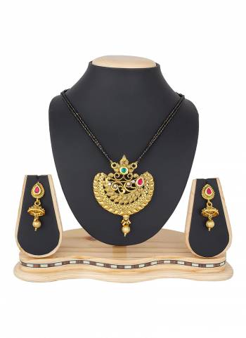 Grab This Heavy Mangalsutra Set In Golden Color Which Comes With A Pair Of Earrings, Also It Can Be Paired With Colored Ethnic Attire. Buy Now.