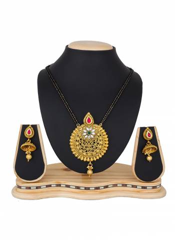 Grab This Heavy Mangalsutra Set In Golden Color Which Comes With A Pair Of Earrings, Also It Can Be Paired With Colored Ethnic Attire. Buy Now.