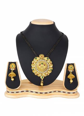 Grab This Heavy Mangalsutra Set In Golden Color Which Comes With A Pair Of Earrings, Also It Can Be Paired With Colored Ethnic Attire. Buy Now.