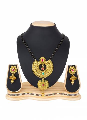 Grab This Heavy Mangalsutra Set In Golden Color Which Comes With A Pair Of Earrings, Also It Can Be Paired With Colored Ethnic Attire. Buy Now.