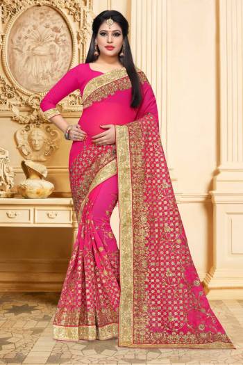 Shine Bright In This Lovely Rani Pink Colored Saree Paired With Rani Pink Colored Blouse. It IS Georgette Based Beautified With Heavy Embroidery. Buy Now.