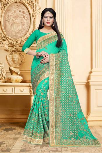 Grab This Beautiful Designer Saree In Lovely Shade With This Sea Green Colored Saree Paired With Sea Green Colored Blouse. This Saree And Blouse Are Georgette Based Beautified With Heavy Embroidery. 