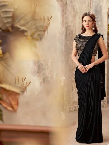 Flaunt your trendsetter attitude in this creatively draped saree  and look celestial. Opt for a very simple hairdo and bright lipcolor .