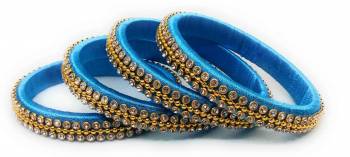 Grab This Beautiful Set Of Four Bangles To Pair Up With Your Ethnic Wear Or You Can Also Mix It With Other Plain Bangles For More Heavy Look. It Is Made With Resham Thread And Beautified With Stone Work, Pair These Up With Same Or Any Contrasting Colored Ethnic Attire.