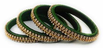 Grab This Beautiful Set Of Four Bangles To Pair Up With Your Ethnic Wear Or You Can Also Mix It With Other Plain Bangles For More Heavy Look. It Is Made With Resham Thread And Beautified With Stone Work, Pair These Up With Same Or Any Contrasting Colored Ethnic Attire.