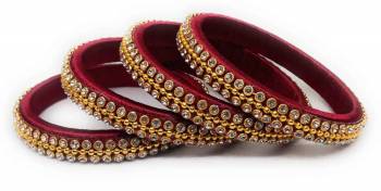 Grab This Beautiful Set Of Four Bangles To Pair Up With Your Ethnic Wear Or You Can Also Mix It With Other Plain Bangles For More Heavy Look. It Is Made With Resham Thread And Beautified With Stone Work, Pair These Up With Same Or Any Contrasting Colored Ethnic Attire.