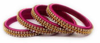 Grab This Beautiful Set Of Four Bangles To Pair Up With Your Ethnic Wear Or You Can Also Mix It With Other Plain Bangles For More Heavy Look. It Is Made With Resham Thread And Beautified With Stone Work, Pair These Up With Same Or Any Contrasting Colored Ethnic Attire.