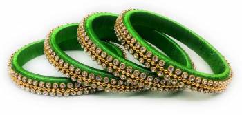 Grab This Beautiful Set Of Four Bangles To Pair Up With Your Ethnic Wear Or You Can Also Mix It With Other Plain Bangles For More Heavy Look. It Is Made With Resham Thread And Beautified With Stone Work, Pair These Up With Same Or Any Contrasting Colored Ethnic Attire.