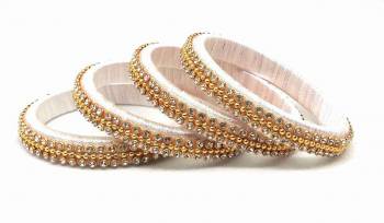 Grab This Beautiful Set Of Four Bangles To Pair Up With Your Ethnic Wear Or You Can Also Mix It With Other Plain Bangles For More Heavy Look. It Is Made With Resham Thread And Beautified With Stone Work, Pair These Up With Same Or Any Contrasting Colored Ethnic Attire.