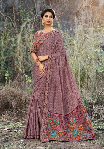 Rich And Elegant Looking Color Pallete Is Here With This Designer Printed Saree In Mauve Color Paired With Multi Colored Blouse. This Saree And Blouse Are Satin Georgette Based Beautified With Floral Prints. 