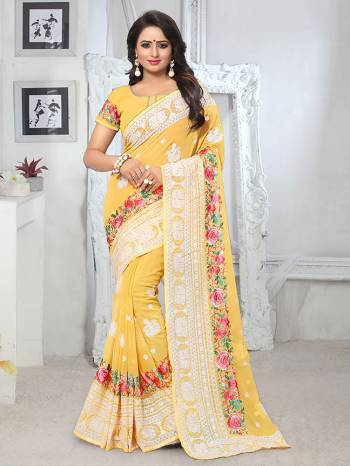 You Will Definitely Earn Lots Of Compliments Wearing This Beautiful Georgette Based Saree Paired With Georgette Fabricated Blouse. This Saree Has Heavy Thread Embroidery Giving It A More Attractive Look. 