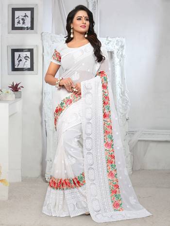 Grab This Pretty Georgette Based Saree For The Upcoming Festive And Wedding Season. It Is Beautified With Heavy Thread embroidery All Over. 