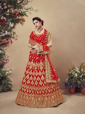 Here Is A Perfect Bridal Look For You With This Heavy designer Lehenga Choli In Red Color. This Lehenga Choli Is Velvet Based Paired With Net Fabricated Dupatta.Its Fabric Also Ensures Superb Comfort Throughout The Gala. 