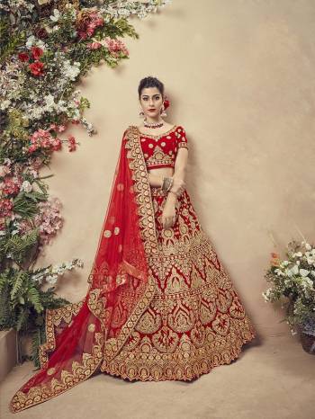 Get Ready For Your Big Day With This Heavy Designer Lehenga Choli In Red Color. This Heavy Embroidered Lehenga Choli Is Fabricated On Velvet Paired With Net Fabricated Dupatta. It Is Beautified With Heavy Jari Embroidery and Stone Work. Buy Now. 