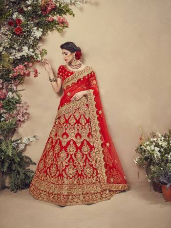 Here Is A Perfect Bridal Look For You With This Heavy designer Lehenga Choli In Red Color. This Lehenga Choli Is Velvet Based Paired With Net Fabricated Dupatta.Its Fabric Also Ensures Superb Comfort Throughout The Gala. 