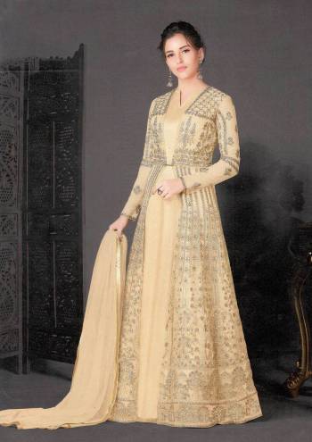 Add This Very Pretty Designer Indo-Western Suit to Your Wardrobe For The Upcoming Festive And Wedding Season. Its Top And Dupatta Are Net Based Which Comes With A Same Colored Silk Based Inner. It Is Beautified With Heavy Embroidery Making It More Attractive. 