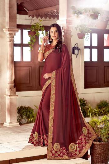 The silken grace Is one that stays forever. Add this maroon toned silk saree to your wardrobe for a culturally enhanced look. 