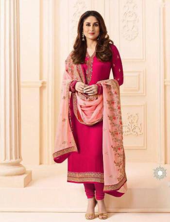 Shine Bright In This Designer Straight Suit In Dark Pink Color Paired With Light Pink Colored Dupatta. Its Top Is Fabricated On Georgette Satin Paired With Santoon Bottom And Chiffon Dupatta. Its Top And Dupatta Are Beautified With Heavy Embroidery. 