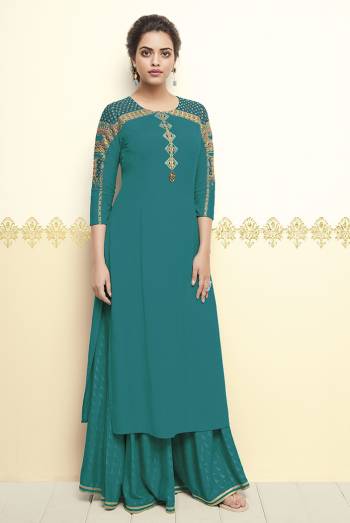 Grab This Pretty Designer Readymade Kurti In Turquoise Blue Color Fabricated On Cotton. It Is Beautified With Attractive Thread Work Over The Sleeve And Top. Also It Is Available In All Regular Sizes. 