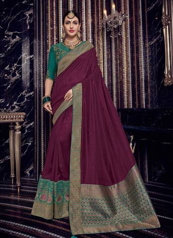 Look gorgeous in this beautiful printed wine color silk fabric with rich jacquard pallu saree. Ideal for party, festive & social gatherings. this gorgeous saree featuring a beautiful mix of designs. Its attractive color and designer heavy design, stone design, silk fabric with rich jacquard pallu and beautiful design all over work over the attire & contrast hemline adds to the look. Comes along with a contrast unstitched blouse.