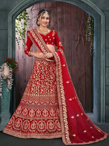 Here Is A Perfect Bridal Look For You With This Heavy designer Lehenga Choli In Red Color. This Lehenga Choli Is Velvet Based Paired With Net Fabricated Dupatta.Its Fabric Also Ensures Superb Comfort Throughout The Gala.