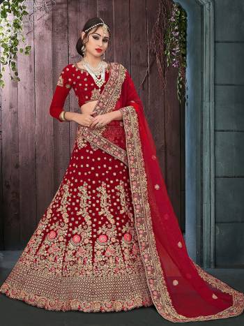 Here Is A Perfect Bridal Look For You With This Heavy designer Lehenga Choli In Red Color. This Lehenga Choli Is Velvet Based Paired With Net Fabricated Dupatta.Its Fabric Also Ensures Superb Comfort Throughout The Gala.