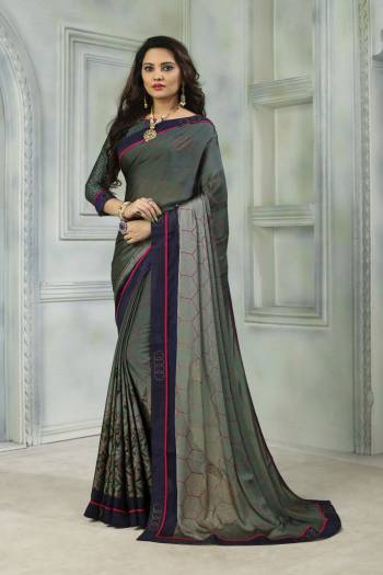 Here Is A Saree For Your Semi-Casual Or Festive Wear. This Lovely Saree And Blouse Are Fabricated On Satin Chiffon Beautified With Prints And Stone Work. Also It Is Light Weight And Soft Towards Skin Which Ensures Superb Comfort all Day Long. 