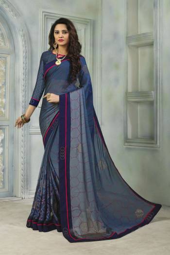 Here Is A Saree For Your Semi-Casual Or Festive Wear. This Lovely Saree And Blouse Are Fabricated On Satin Chiffon Beautified With Prints And Stone Work. Also It Is Light Weight And Soft Towards Skin Which Ensures Superb Comfort all Day Long. 