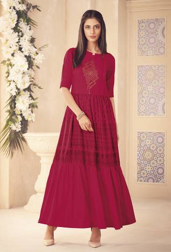 Bright And Appealing Color Is Here With This Designer Readymade Kurti In Dark Pink Color Fabricated On Rayon. It Is Beautified With Prints And Stone Work. Also It Is Light In Weight And Easy To Carry All Day Long. Buy Now.