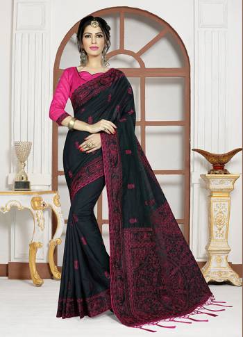 For A Bold And Beautiful Look, Grab This Designer Saree In Black Color Paired With Rani Pink Colored Blouse. This Satee And Blouse Are Silk based Beautified With Resham Embroidery And Stone Work. 