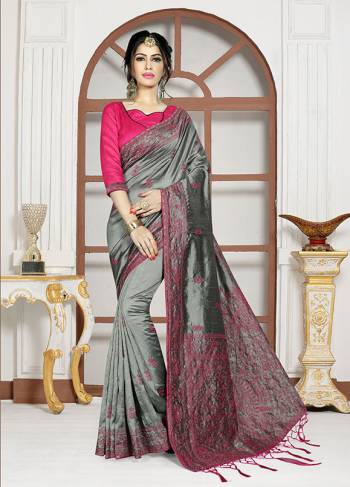 For A Bold And Beautiful Look, Grab This Designer Saree In Steel Grey Color Paired With Rani Pink Colored Blouse. This Satee And Blouse Are Silk based Beautified With Resham Embroidery And Stone Work. 