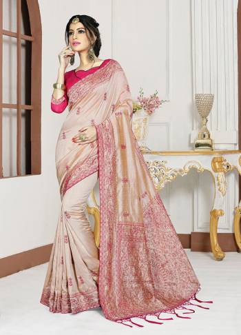 Simple And Elegant Looking Designer Saree In Here In Beige Color Paired With Rani Pink Colored Blouse. This Saree And Blouse Are Fabricated On Art Silk Beautified With Attractive Embroidery. Buy Now.