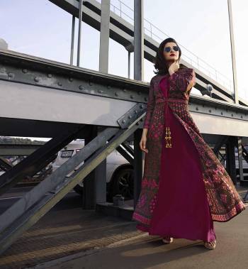 Here Is A Very Pretty Designer Readymade Kurti In Brown And Magenta Pink Color Fabricated On Silk. Its Jacket Has Pretty Floral Prints All Over With Stone Work. 