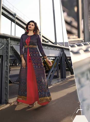 Grab This Designer Readymade Kurti For The Upcoming Festive Wear In Purple And Red Color Fabricated On Silk. This Pretty Kurti IS Beautified With Prints And Stone Work. 