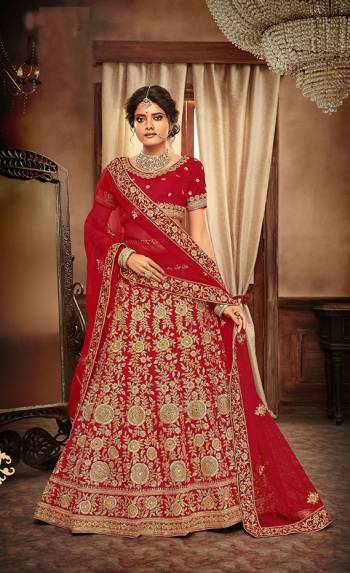 Get Ready For Your Big Day With This Heavy Designer Lehenga Choli In Red Color. This Heavy Embroidered Lehenga Choli Is Fabricated On Velvet Paired With Net Fabricated Dupatta. It Is Beautified With Heavy Jari & Thread Embroidery and Stone Work. Buy Now