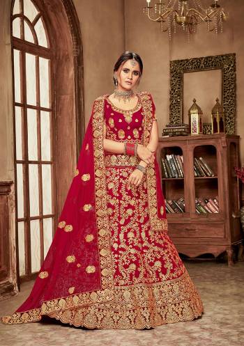 Here Is A Perfect Bridal Look For You With This Heavy designer Lehenga Choli In Red Color. This Lehenga Choli Is Velvet Based Paired With Net Fabricated Dupatta.Its Fabric Also Ensures Superb Comfort Throughout The Gala