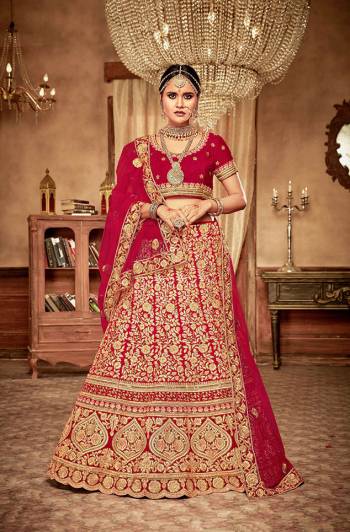 Here Is A Perfect Bridal Look For You With This Heavy designer Lehenga Choli In Red Color. This Lehenga Choli Is Velvet Based Paired With Net Fabricated Dupatta.Its Fabric Also Ensures Superb Comfort Throughout The Gala