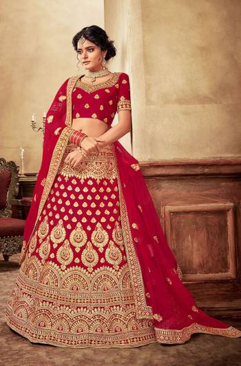 Get Ready For Your Big Day With This Heavy Designer Lehenga Choli In Red Color. This Heavy Embroidered Lehenga Choli Is Fabricated On Velvet Paired With Net Fabricated Dupatta. It Is Beautified With Heavy Jari & Thread Embroidery and Stone Work. Buy Now