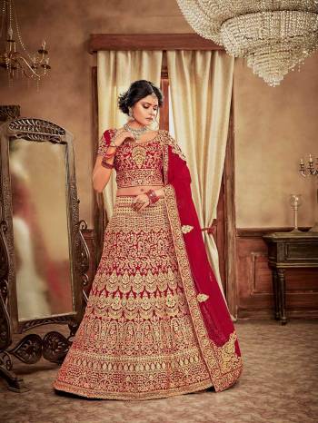 Here Is A Perfect Bridal Look For You With This Heavy designer Lehenga Choli In Red Color. This Lehenga Choli Is Velvet Based Paired With Net Fabricated Dupatta.Its Fabric Also Ensures Superb Comfort Throughout The Gala