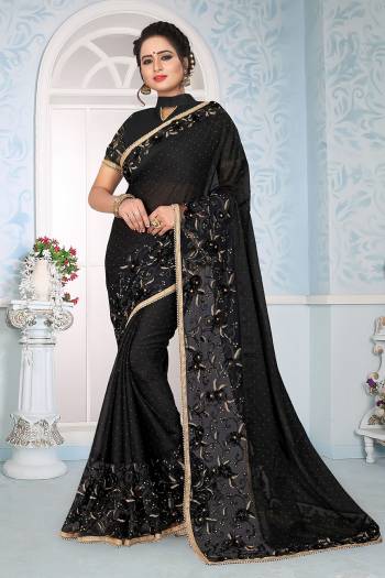 For A Bold And Beautiful Look, Grab This Designer Saree In Black Color Paired With Black Colored Blouse. This Saree Is Fabricated On Satin Silk Paired With Art Silk Fabricated Blouse. It Has Very Pretty Fancy Embroidery Over The Saree And Blouse. 