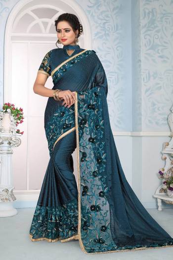 Enhance Your Personality Wearing This Designer Blue Colored Saree Paired With Blue Colored Blouse, This Saree Is Fabricated On Satin Silk Paired With Art Silk Fabricated Blouse. It Is Beautified With Fancy Embroidery All Over.