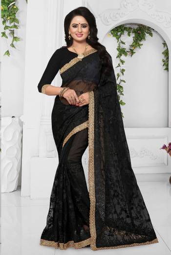 Grab This Heavy Designer Saree For The Upcoming Wedding Season. This Beautiful Heavy Embroidered Saree And Blouse Are Fabricated On Net Beautified With Resham Embroidery And Stone Work. Pair It Up Minimal Elegant Accessories. 