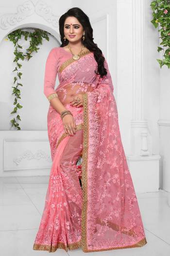 Look Beautiful In This Heavy Designer Net Based Saree. This Saree And Blouse Are Fabricated On Net Beautified With Heavy Embroidery. It Is Easy To Drape And Comfortable To Carry All Day Long. 