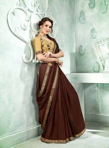 Rich and Elegant Looking Designer Saree Is Here In Brown Color Paired With Beige Colored Blouse. This Saree Is Fabricated On Georgette Paired With Art Silk Fabricated Blouse. It Is Beautified With Resham Embroidery And Lace Border. 