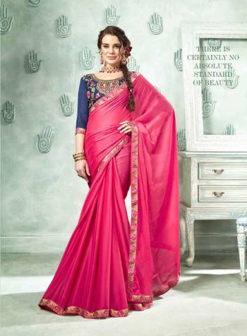 Look Pretty In This Designer Pink Colored Saree Paired With Contrasting Navy Blue Colored Blouse. This Saree Is Georgette Based Paired With Art Silk Fabricated Blouse. Buy This Now.