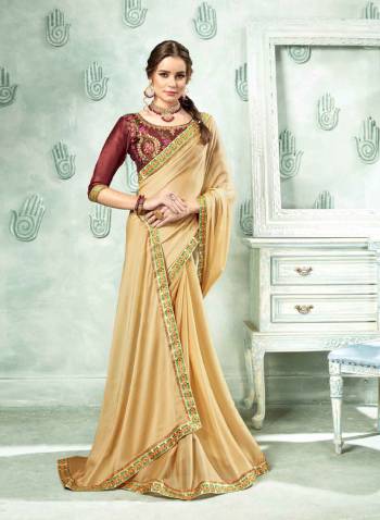 Simple And Elegant Looking Designer Saree Is Here In Beige Color Paired With Maroon Colored Blouse. This Saree Is Georgette Based Paired With Art Silk Blouse. Its Rich Color Pallete And Fabric Will Earn You Lots Of Compliments From Onlookers.