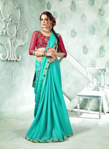 Adorn A Pretty Angelic Look In This Beautiful Designer Saree In Turquoise Blue Color Paired With Contrasting Magenta Pink Colored Blouse. This Saree Is Fabricated On Georgette Paired With Art Silk Fabricated Blouse. Buy Now.